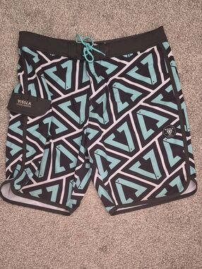 VISSLA Men’s Teal and Black Geometric Board Shorts